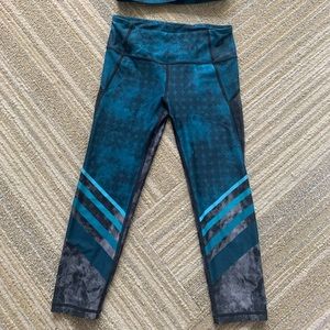 With workout set (sports bra and leggings)